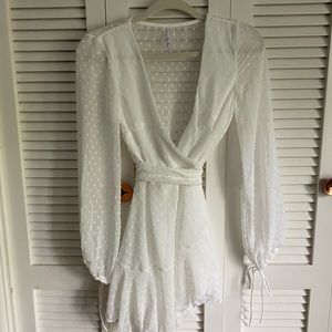 white lucy in the sky long sleeve wrap dress